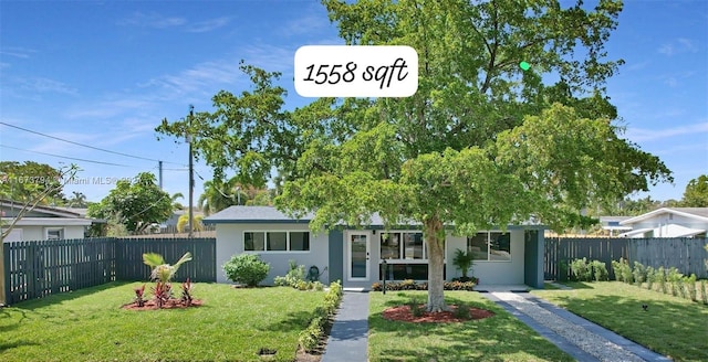 view of front facade with a front yard