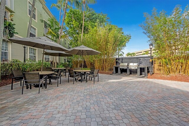 view of patio featuring exterior kitchen and area for grilling