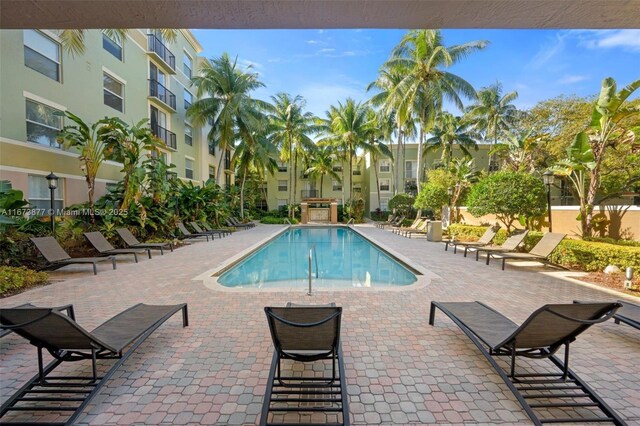 view of pool featuring a patio