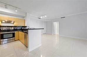 kitchen with track lighting, light brown cabinetry, stainless steel appliances, and light tile patterned floors