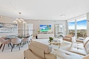 living room featuring an inviting chandelier