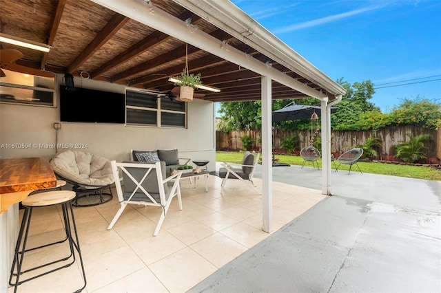 view of patio / terrace featuring an outdoor living space and ceiling fan