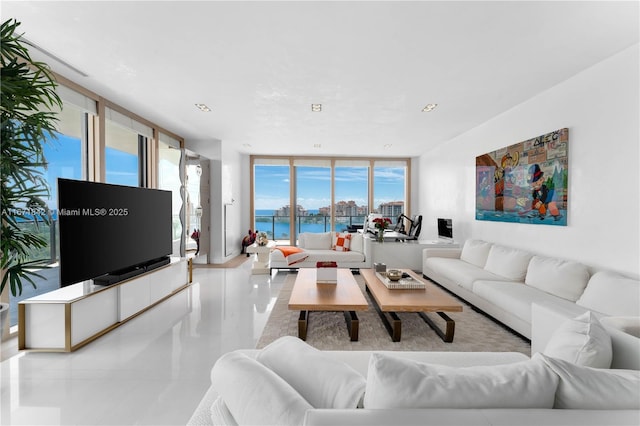 800 S Pointe Dr Unit 901, Miami Beach, FL 33139 - tiled living area featuring floor to ceiling windows