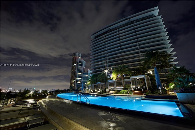 800 S Pointe Dr Unit 901, Miami Beach, FL 33139 - pool at night with a community pool