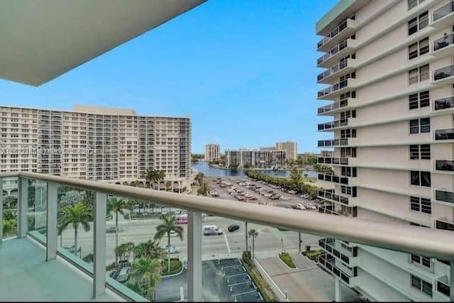 balcony featuring a water view