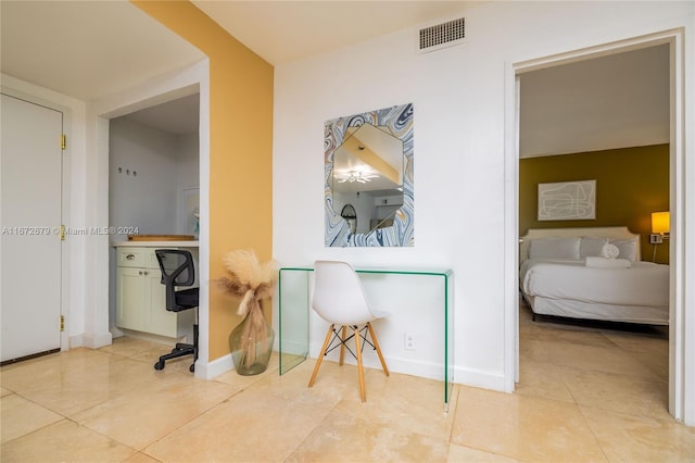 hallway featuring tile patterned floors