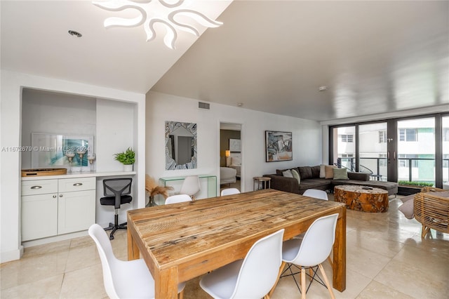 tiled dining space with built in desk