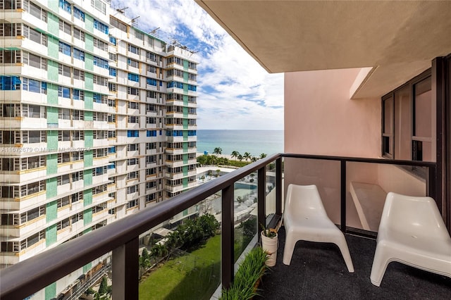 balcony featuring a water view