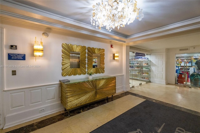 reception area with an inviting chandelier