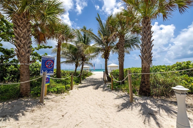 surrounding community featuring a water view