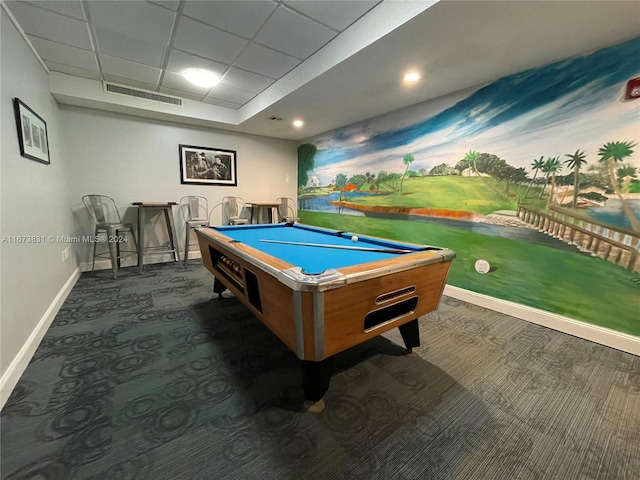 recreation room featuring a paneled ceiling, billiards, and dark carpet