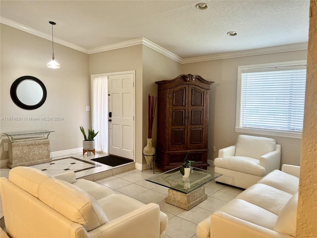 tiled living room featuring a textured ceiling and ornamental molding