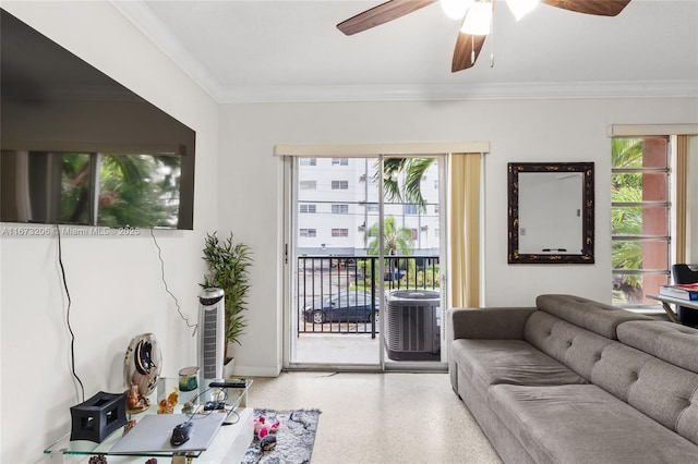 living room featuring ceiling fan and ornamental molding