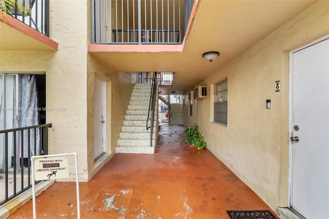 property entrance featuring a patio