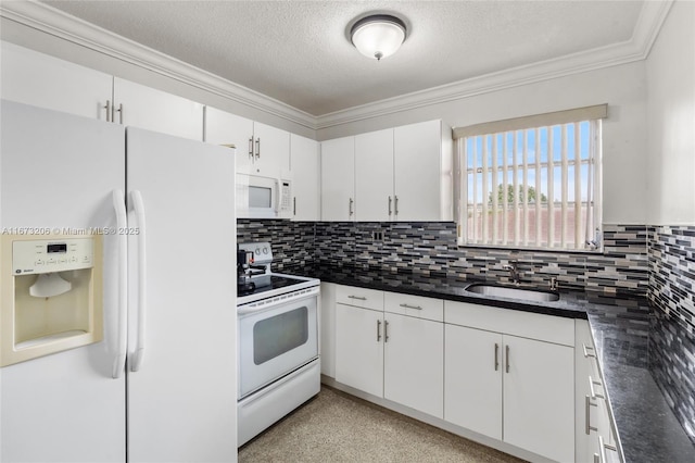 kitchen with white appliances, white cabinets, sink, a textured ceiling, and tasteful backsplash