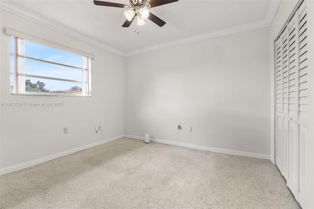 unfurnished bedroom with a closet, ceiling fan, and ornamental molding