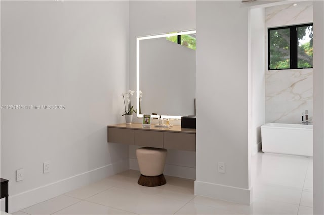 bathroom with vanity and tile patterned floors