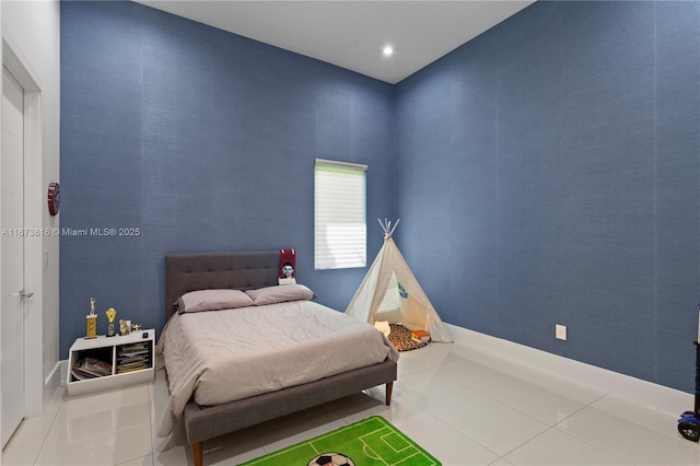 bedroom featuring tile patterned flooring