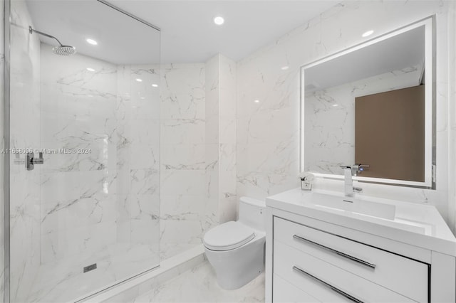 bathroom with vanity, toilet, tile walls, and tiled shower