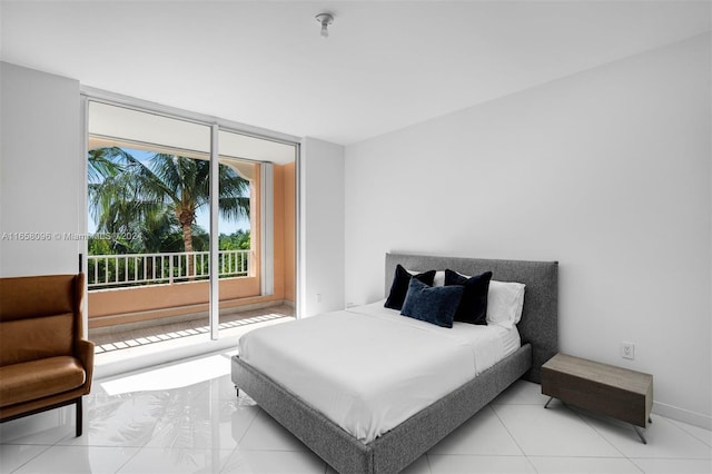 bedroom featuring access to outside and tile patterned flooring