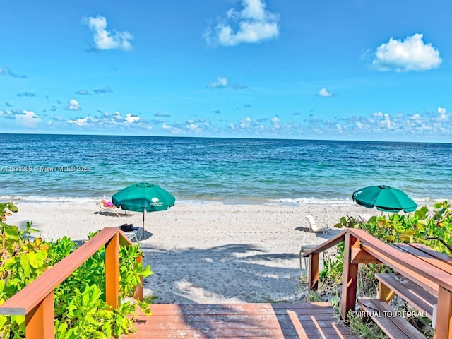 property view of water with a beach view