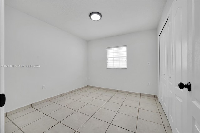 view of tiled spare room