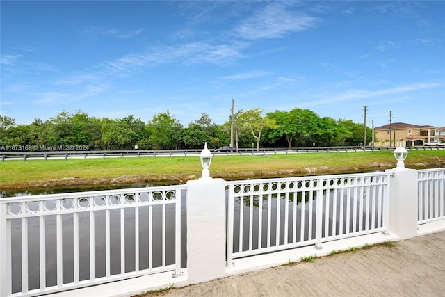 view of gate featuring a rural view