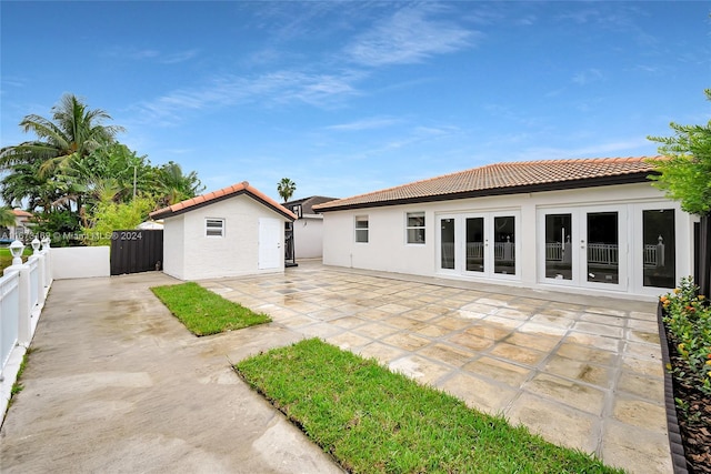 back of house featuring a patio