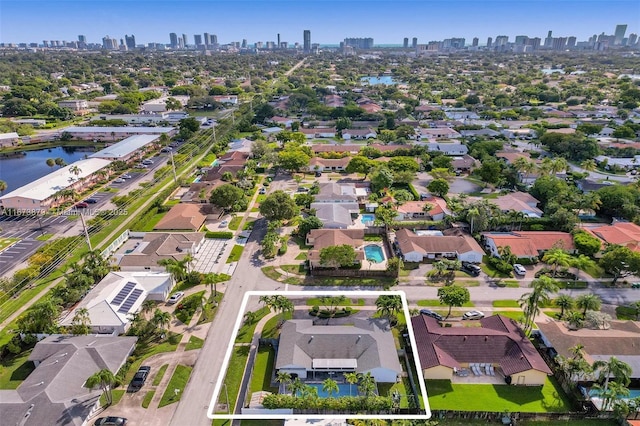 aerial view with a water view and a city view