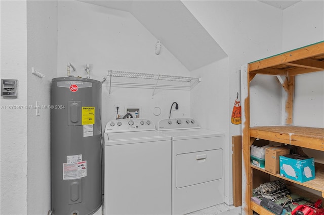 washroom featuring water heater and independent washer and dryer