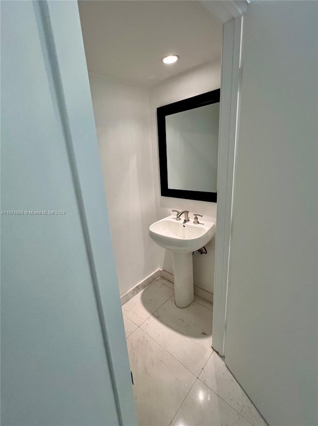 bathroom featuring tile patterned flooring