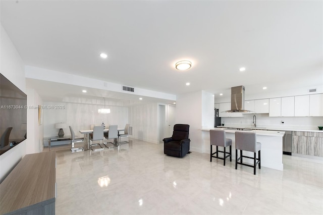 living room featuring sink