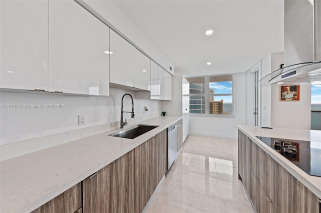 kitchen with white cabinetry, sink, wall chimney range hood, stainless steel dishwasher, and black electric stovetop