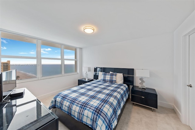 bedroom with a water view