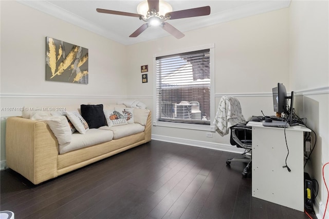 home office featuring dark wood-style floors, baseboards, a ceiling fan, and crown molding