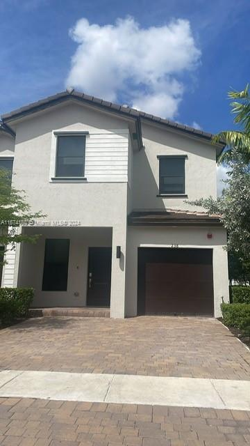 view of property with a garage