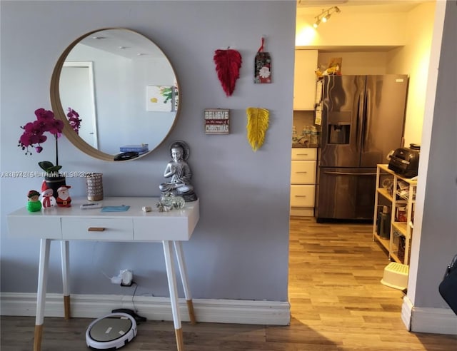 bathroom featuring wood-type flooring