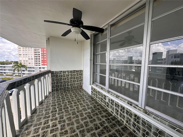 balcony featuring ceiling fan