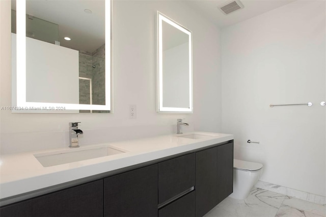 bathroom featuring walk in shower, vanity, and toilet