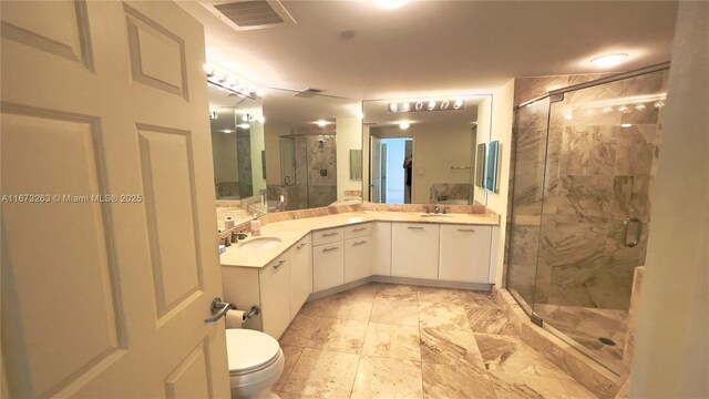 510 NW 84th Ave Unit 529, Plantation, FL 33324 - full bath with a shower stall, double vanity, and marble finish flooring