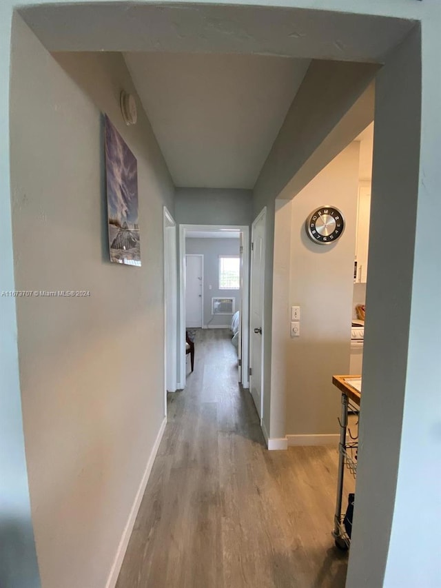 851 Atlantic Shores Blvd Unit 225, Hallandale Beach, FL 33009 - hallway featuring light wood-style flooring and baseboards
