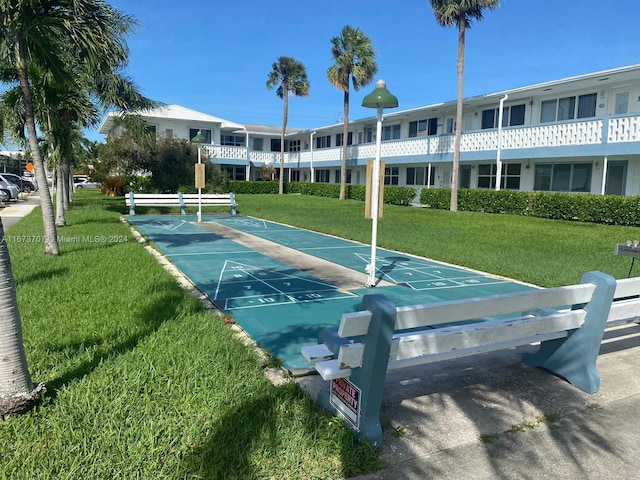 851 Atlantic Shores Blvd Unit 225, Hallandale Beach, FL 33009 - view of home's community with a lawn and shuffleboard