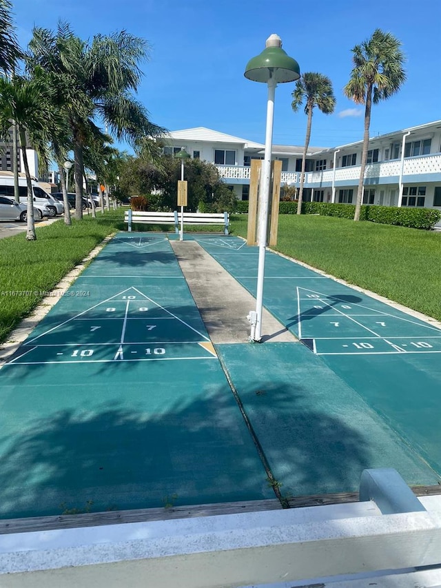 851 Atlantic Shores Blvd Unit 225, Hallandale Beach, FL 33009 - view of home's community with shuffleboard and a yard