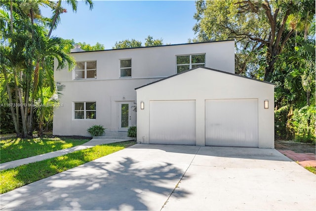 view of front of property with a garage