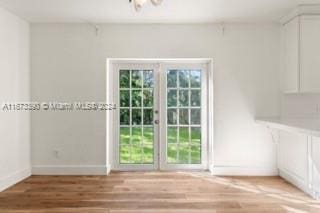 unfurnished room featuring light wood-type flooring