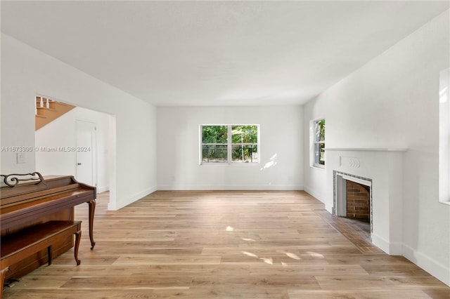 living room with light hardwood / wood-style floors