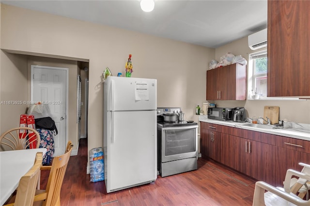 kitchen with stainless steel electric stove, a wall mounted air conditioner, sink, dark hardwood / wood-style flooring, and white fridge