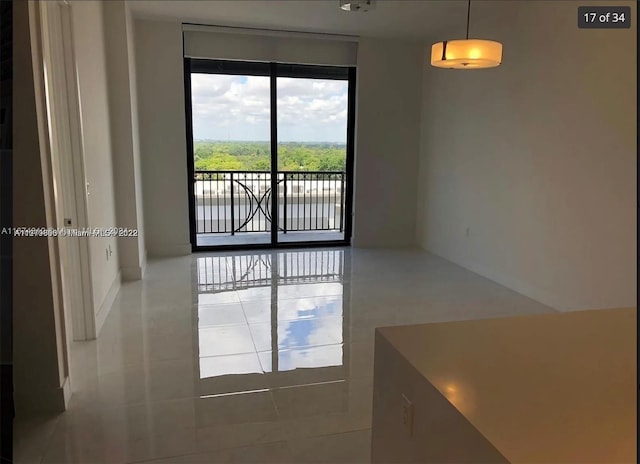 unfurnished dining area featuring tile patterned flooring