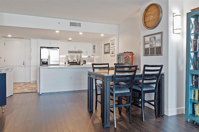 9066 SW 73rd Ct Unit 1205, Miami, FL 33156 - dining area with dark wood-type flooring and recessed lighting