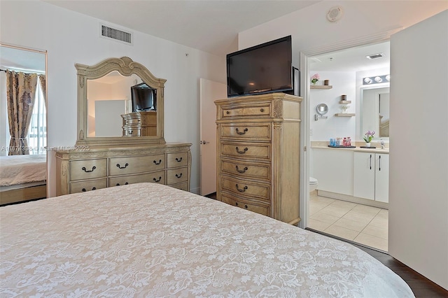 9066 SW 73rd Ct Unit 1205, Miami, FL 33156 - tiled bedroom with ensuite bathroom